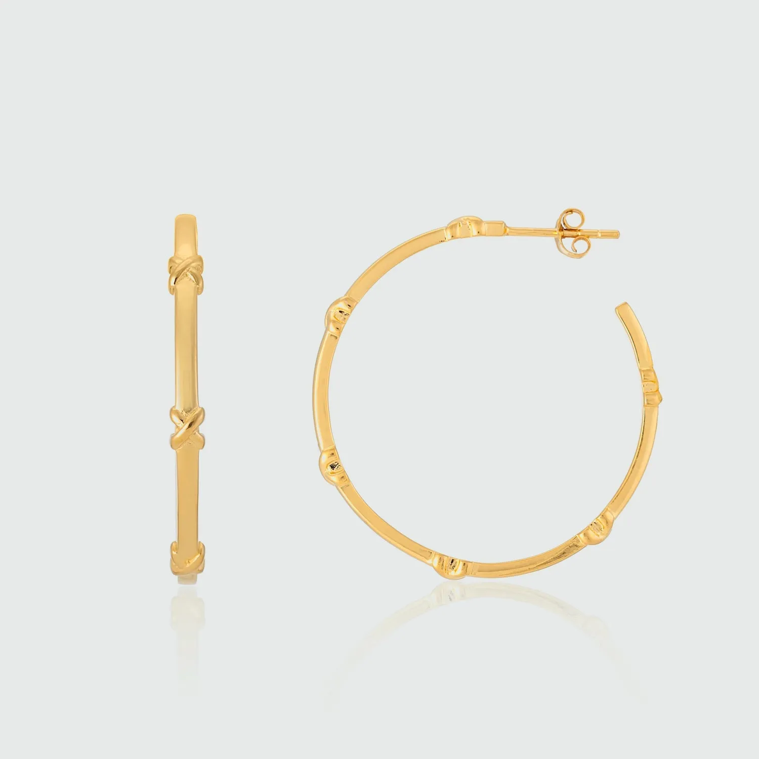 Deia Large Yellow Gold Vermeil Kiss Hoop Earrings