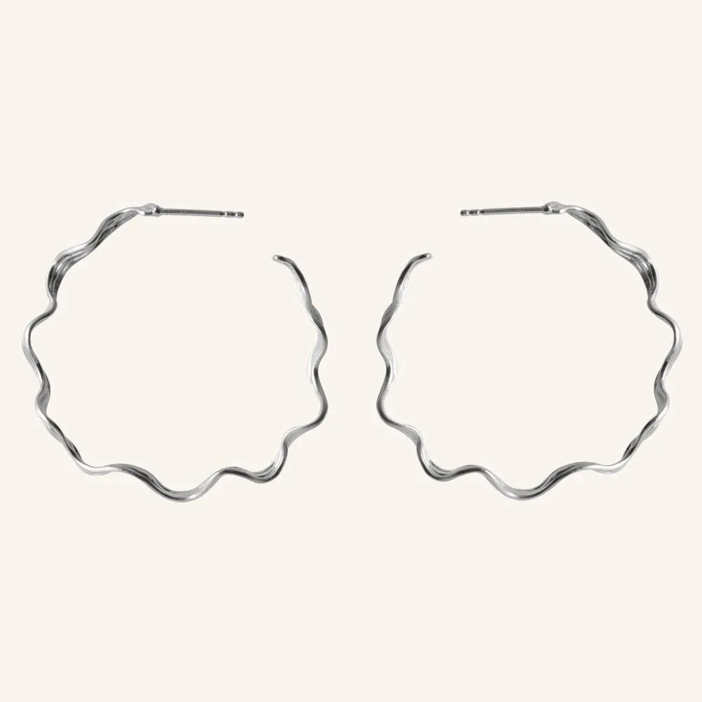 Large Hellir Hoops in Silver and Gold-plated Silver by Pernille Corydon